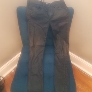 Black leather-look skinny jeans